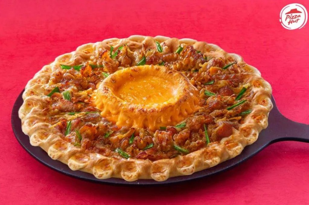 遭達美樂提告抄襲！必勝客列證據回應：火山披薩非達美樂首創